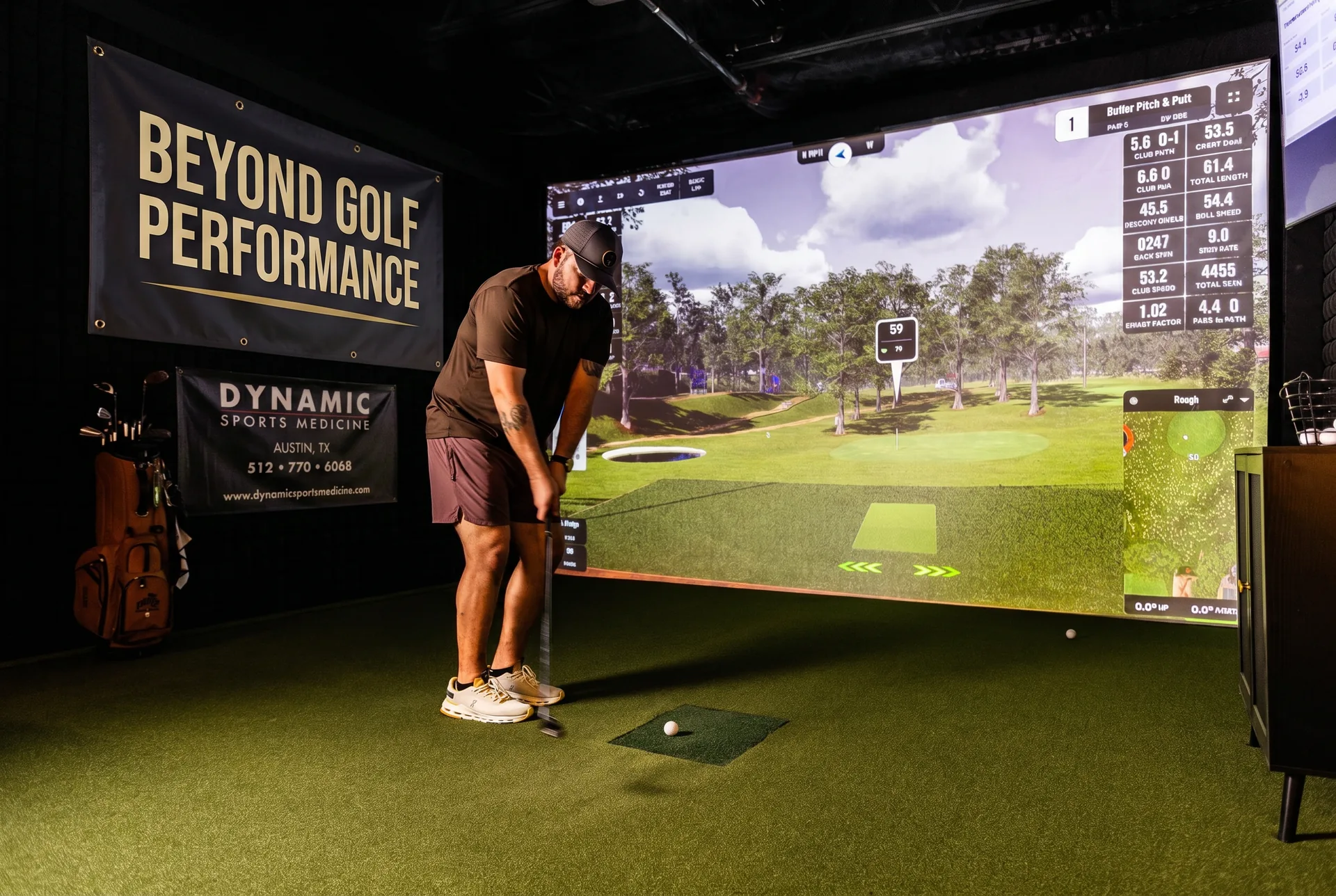 Golfer training on the Foresight simulator at 1872 Golf Club Georgetown